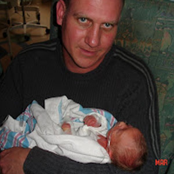 Denise Janson - Day 2 - Dad holding newborn Matthew