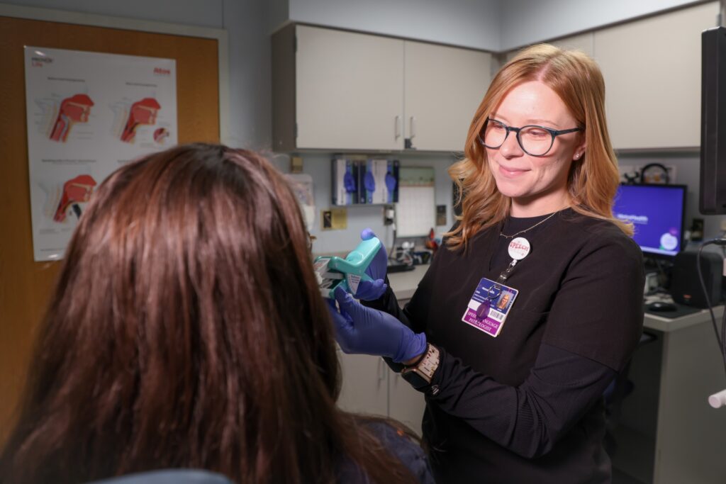 Burn therapist helps facial burn survivor.