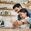 Father and child washing hands