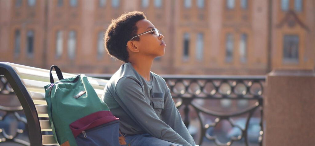 schoolboy on bench