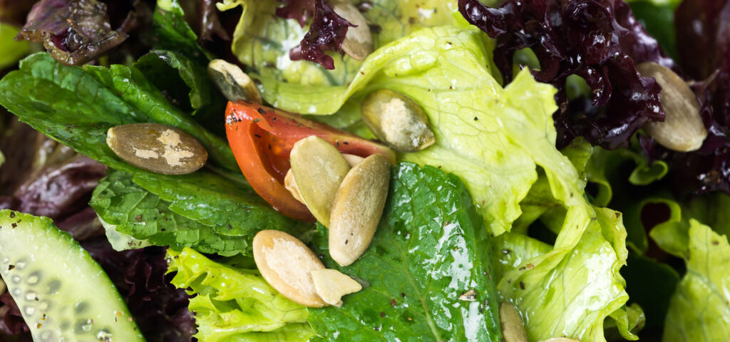 Greens with pumpkin seeds