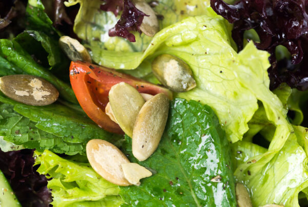 Greens with pumpkin seeds